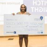 Alexia Price-O'Neal poses for a photo with her first-place check for $10,000